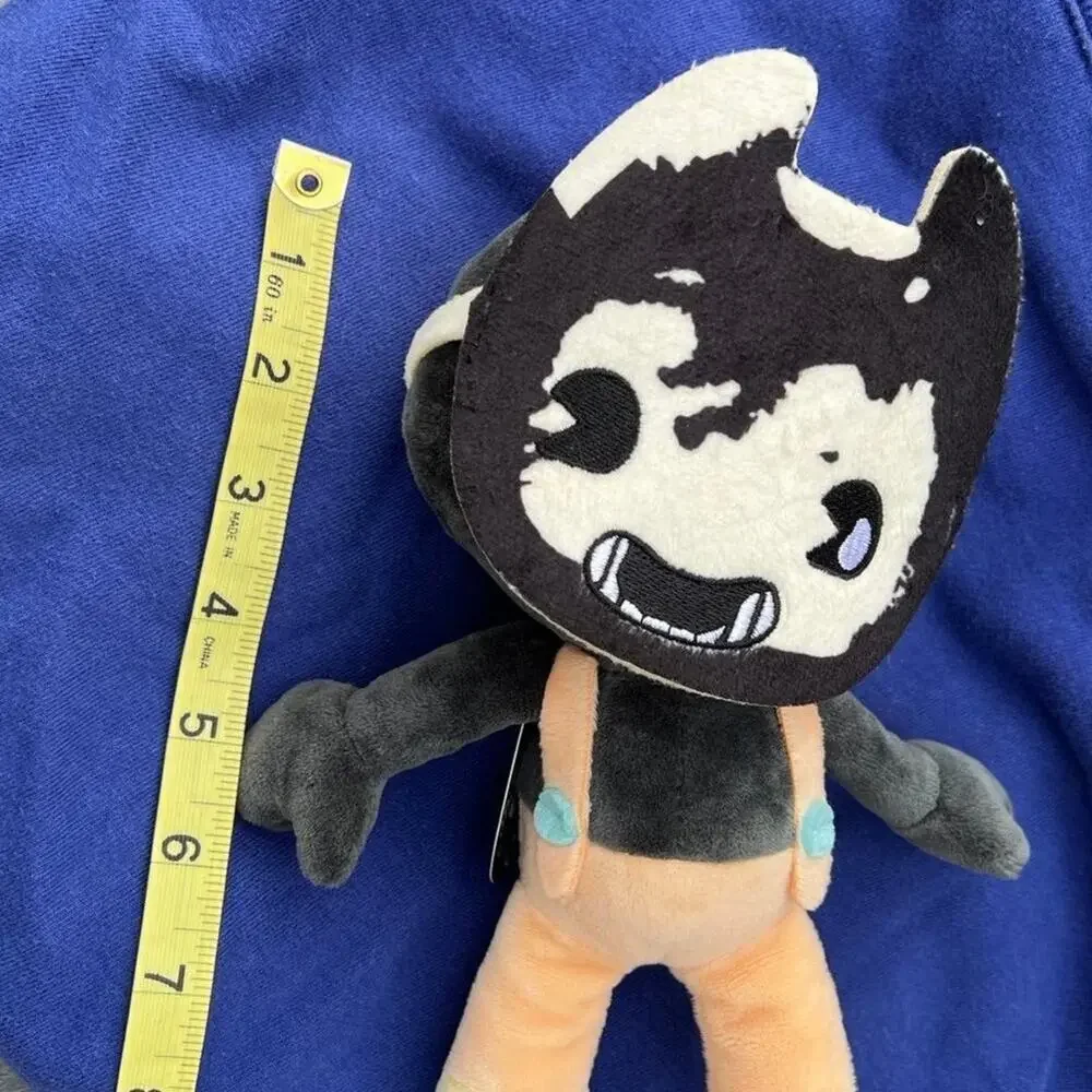 Bendy plush doll with mask